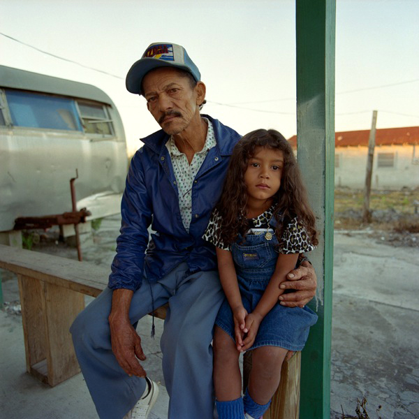 Men and Children standing outdoors